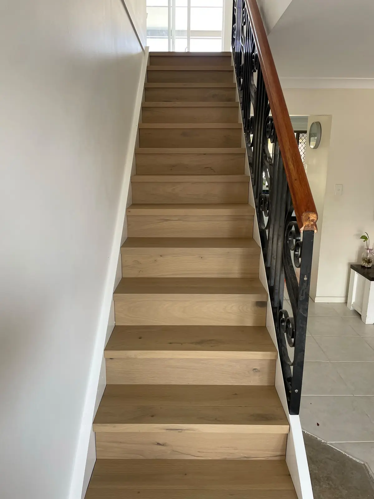 Completed staircase finished with oak treads and risers